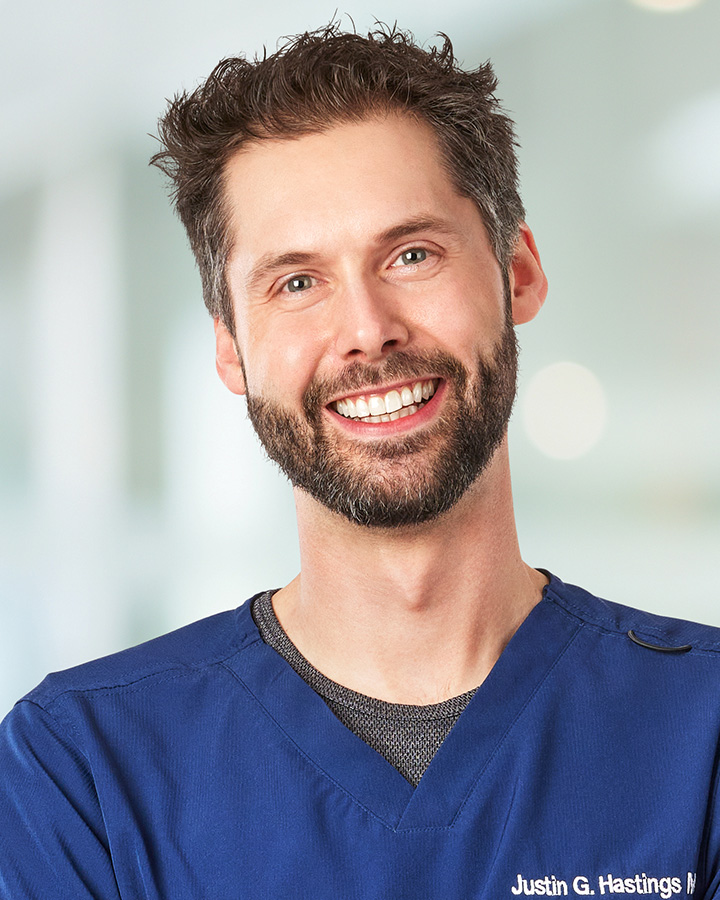 Dr. Justin Hastings